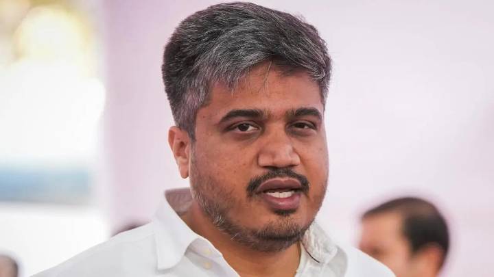 FIR filed after Rohit Pawar shows creation of fake Aadhaar card in Trump`s name