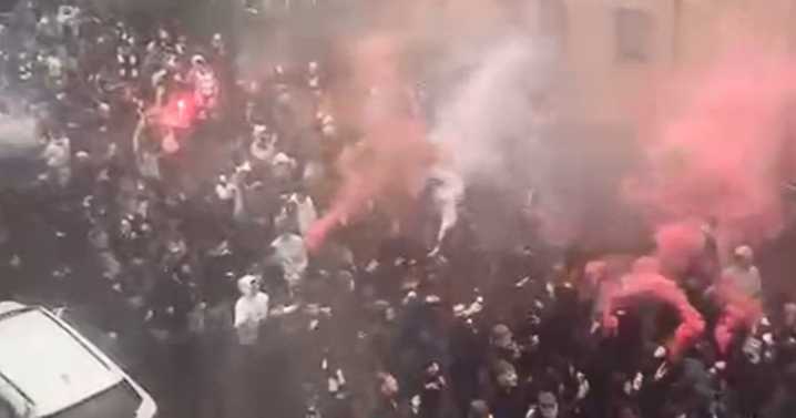 Huge Edinburgh crowds with flares seen making way to Hibs vs Hearts game
