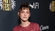 Kristen Stewart puts a gothic spin on the naked dress in sheer oxblood lace