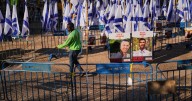The Latest: Gaza ceasefire holds as questions loom over next steps in US plan
