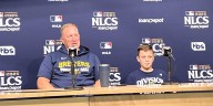 Pat Murphy's son answers reporter's questions at NLCS