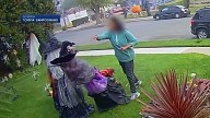 Homeowner’s Halloween decorations repeatedly punched by jogger