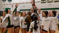 See the photos! Trinity Catholic volleyball captures district championship
