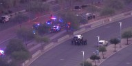 Officer shot, suspect dead after pursuit, standoff in Mesa