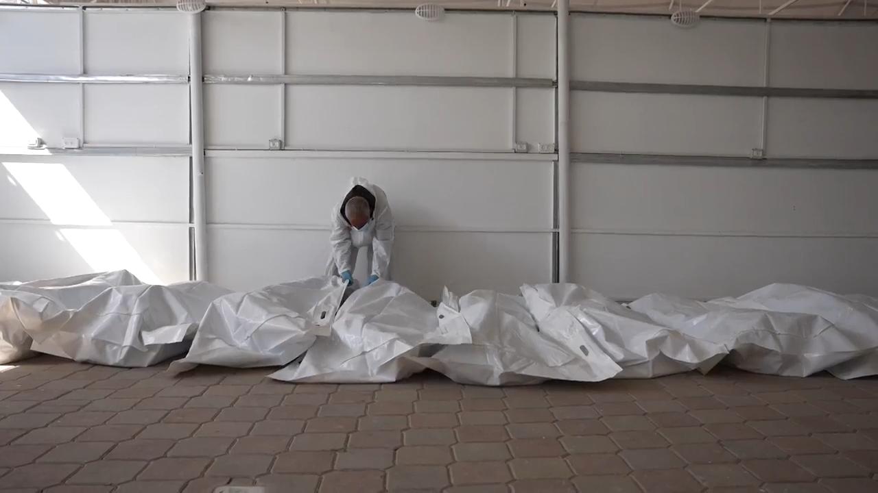 Remains of Palestinians handed over by Israel taken to field hospital in Khan Younis, Gaza