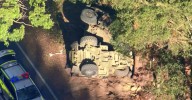 Ferny Hills crash: Woman hospitalised after car collides with army truck near Brisbane