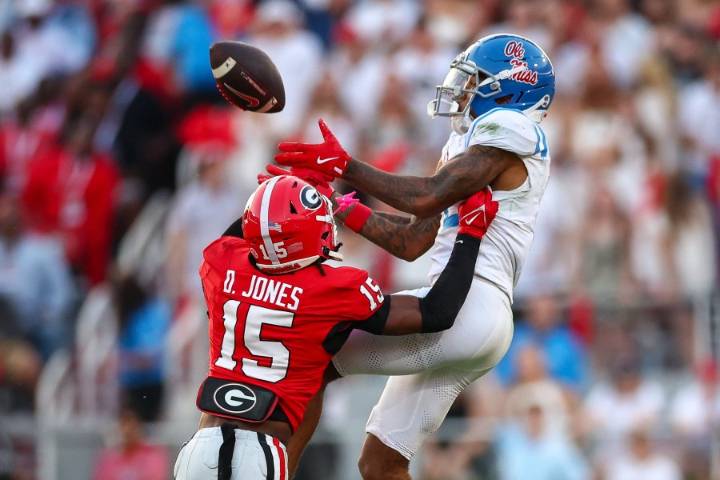 The Latest: Three ranked matchups in the AP Top 25 headline next weekend