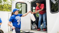 BYU fans collecting shoes at Iowa State tailgate in Ames