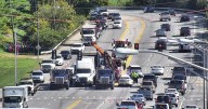 All inbound lanes at Sir Barton Way closed due to broken down semi