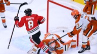 Donato scores in OT, Blackhawks edge Ducks 2-1 in Quenneville's return to Chicago