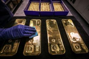 Stocks, gold steady amid political upheaval