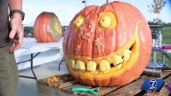 Omaha ice sculptor trades in cold blocks for pumpkins, showing off his carving skills