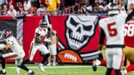 Jamel Dean Ignites Defense with Sack and INT Against San Francisco