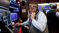 Markets seesaw as volatility grips Wall Street