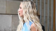 Kesha risks wardrobe malfunction as she ditches underwear and wears only a sheet at PFW
