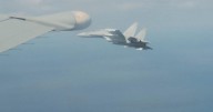 CBS News on board as Chinese jets intercept Canadian air force plane tracking North Korean ships