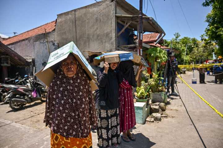 Photos: Hopes dim for survivors after Indonesia school building collapses