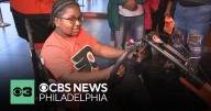 Flyers Alumni gifts 10-year-old living with a disability an adaptive bicycle
