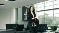 Emma Stone Dresses for Power: Jennifer Johnson Talks Bugonia Costumes
