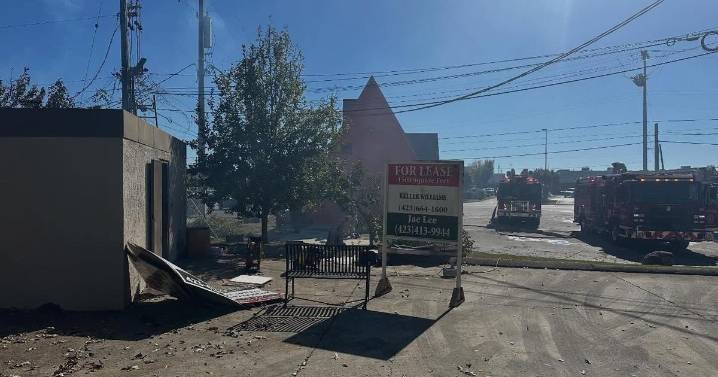 Brush fire spreads to storage building on Brainerd Road