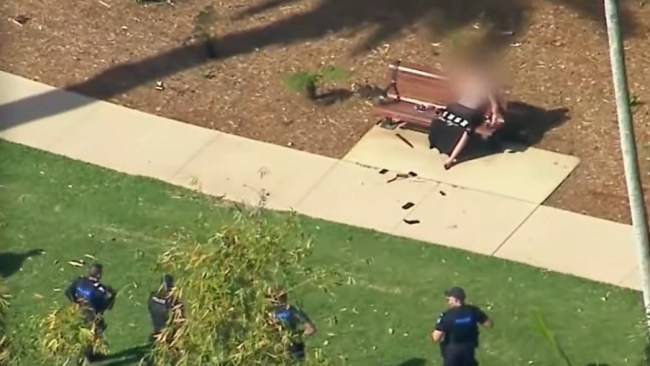 Armed officers swarm popular Brisbane park after reports of man wielding hunting knife force evacuation