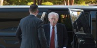 Bolton arrives at court to surrender to authorities on charges in classified information case