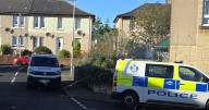 Police probe 'unexplained death' of man at property in Scots town