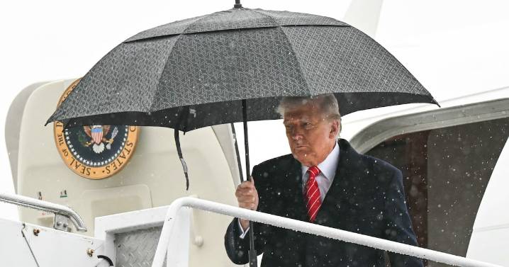 Donald Trump, 79, Needs Help Closing an Umbrella on Air Force One