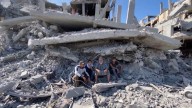 Palestinians return home to rubble but still remain hopeful