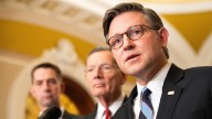 Pressure grows on Johnson to hold vote on military pay