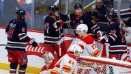 Jets use power play to hand Flames eighth consecutive loss