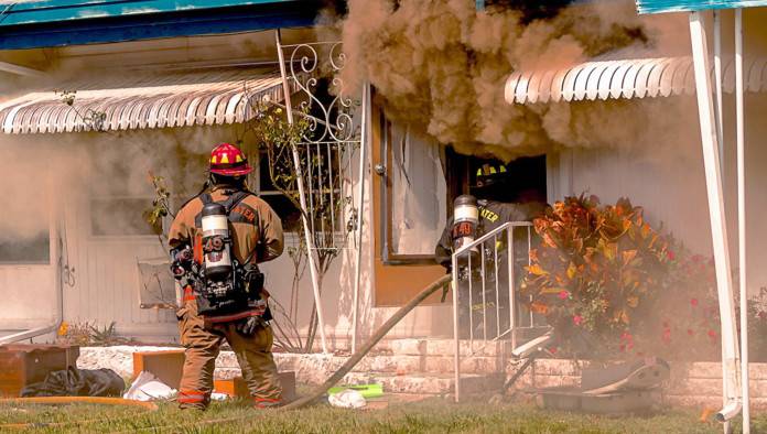 Feminist Hero Refuses To Let Fireman Carry Her From Burning Building