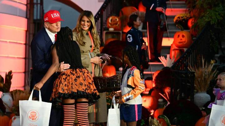 Trump hosts Halloween bash with superheroes, lookalikes amid shutdown