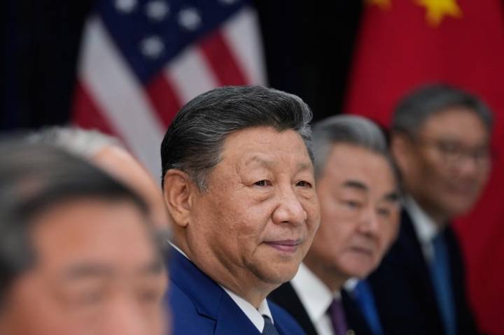 The Latest: Trump says he has deals with China after meeting Xi to try to solve trade tensions