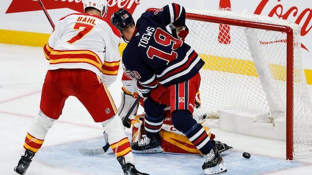 'It's nice to be on the right side now' says hometown star Toews as Jets slash Flames in Winnipeg