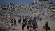 Palestinians return to what's left of their homes as Gaza ceasefire takes effect