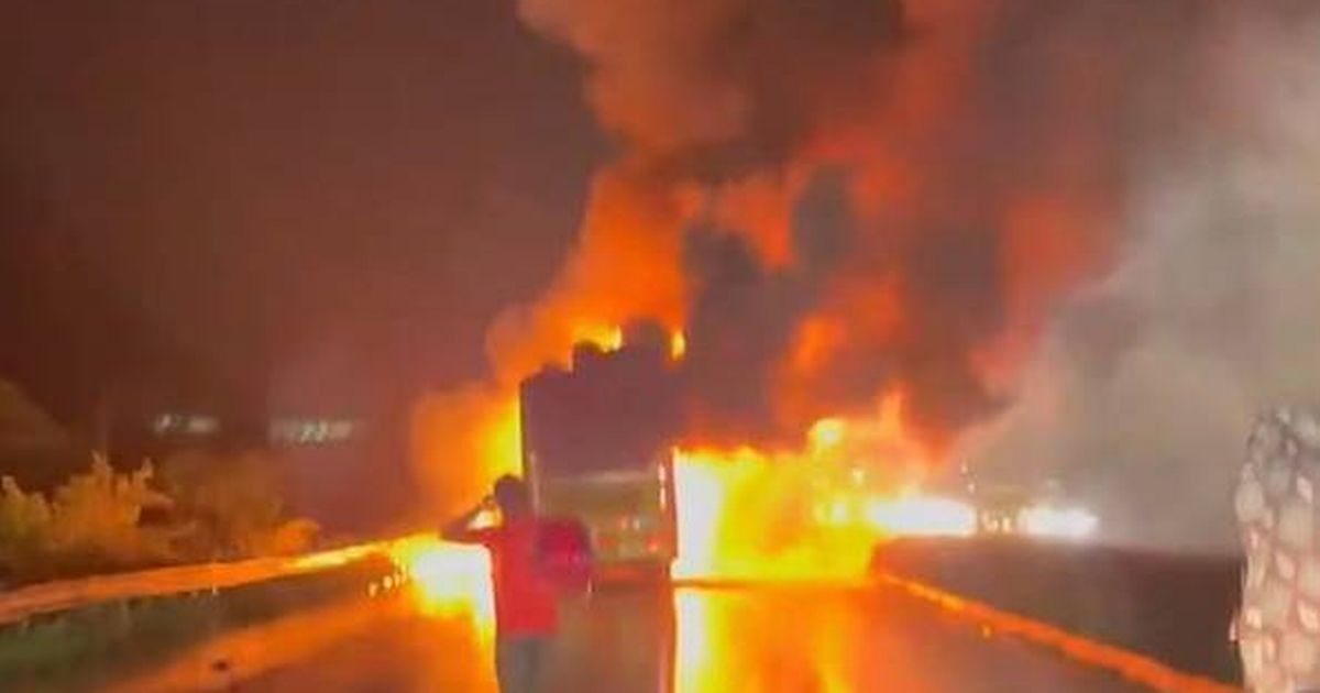 Passengers 'burn alive' after bus erupts in fireball after crash with motorbike
