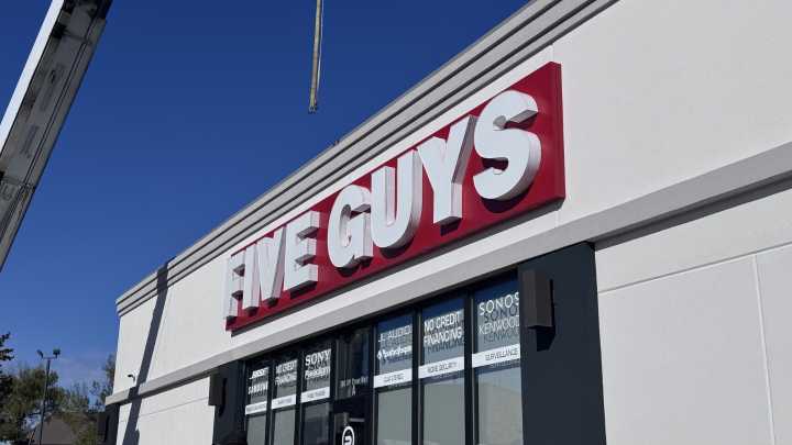 High Five: burger franchise sign installed