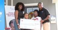 Warrick Dunn Surprises Lafayette Mom with $5,000 Check and Fully Furnished Home