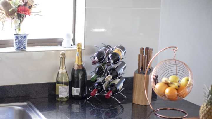 Reuse An Old Kitchen Cabinet To DIY A Wine Rack Like HGTV's Erin Napier Did
