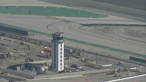 Government shutdown hits air travel, closing a control tower across US