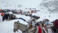 Rescuers aid hikers trapped by heavy snow on Mount Everest