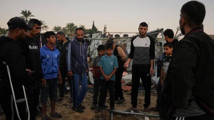 Israel’s military says ceasefire is back on as death toll from strikes in Gaza reaches 104