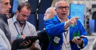 Wall Street climbs to the cusp of records as oil prices jump