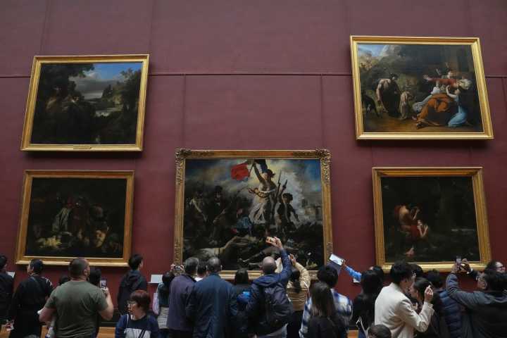 Louvre Museum reopens after heist, as director set to testify to French lawmakers
