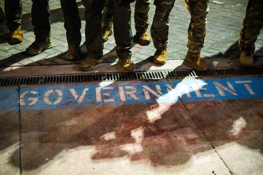 Photos of the mixed reactions to Trump's bid to deploy troops to more US cities