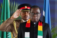 Ruling party calls for Zimbabwe president to stay in power, despite two
