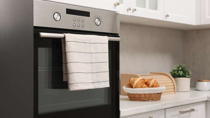 Repurpose A Common Kitchen Essential Into Adorable Hand Towel Storage