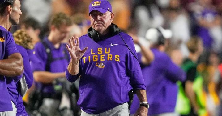 LSU athletic director Scott Woodward resigns, 4 days after the firing of football coach Brian Kelly