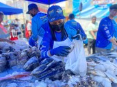 Pescadores venezolanos ofrecen sus productos en Feria de Pescado de China